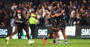 Sharks Put Munster to the Sword in URC Encounter: A 45-0 Humbling in Durban